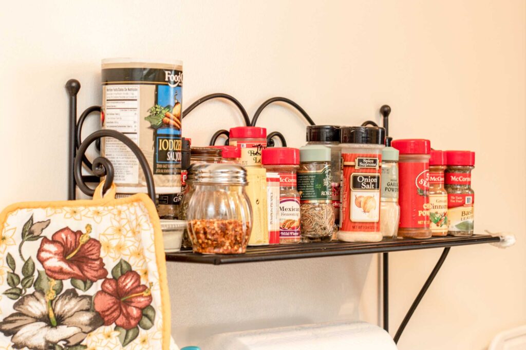 Condiments and spices on a shelf